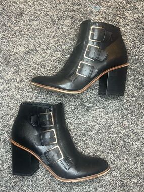Restricted Black Leather Triple Buckle Ankle Boots